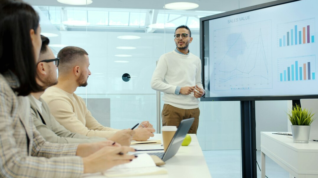 confident person presenting to audience