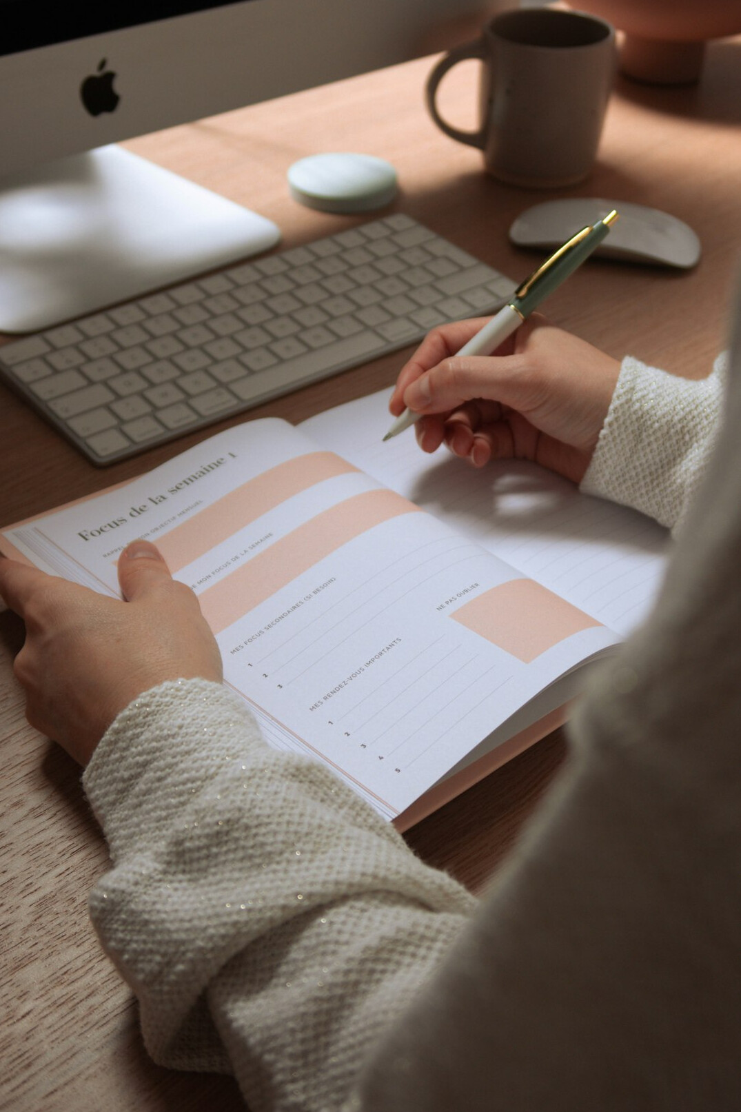 person journaling at desk