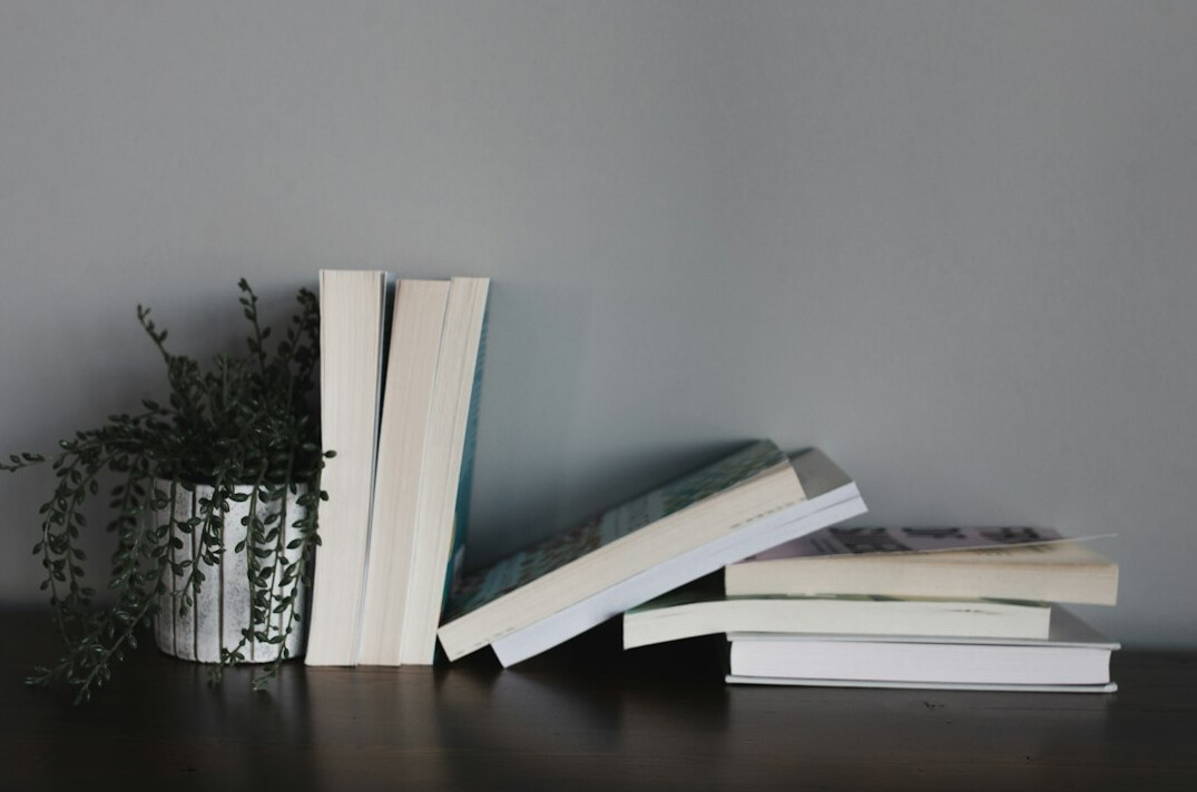 stack of self help books