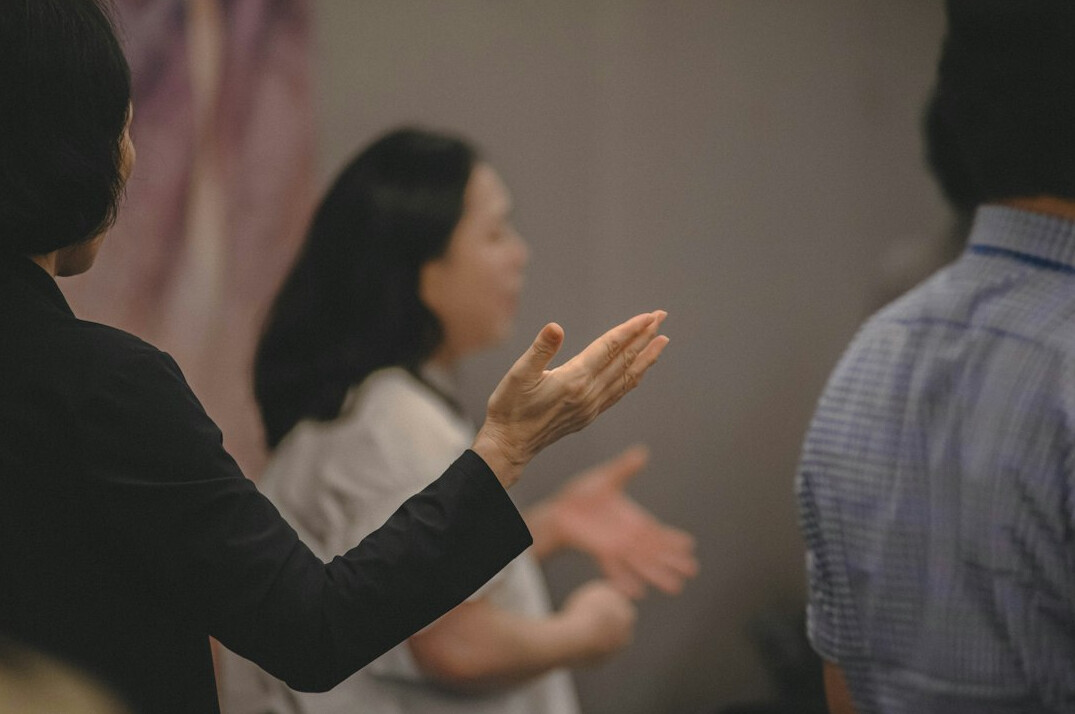 confident person presenting to audience