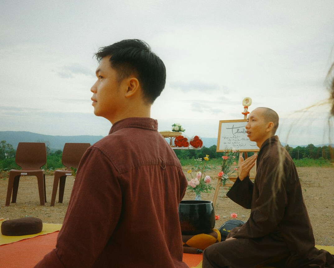 person meditating outdoors